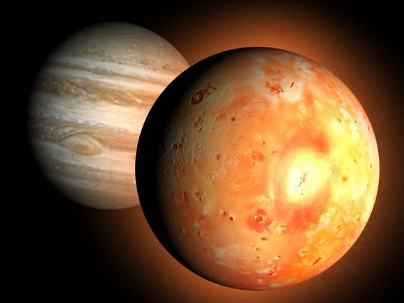 Satélite Io. Al fondo, Júpiter. Estos dos cuerpos celestes presentan una intensa actividad eléctrica en Io